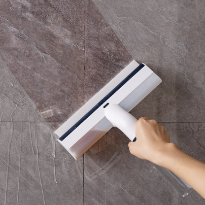 Raclette à vitre anti-fuite avec spray